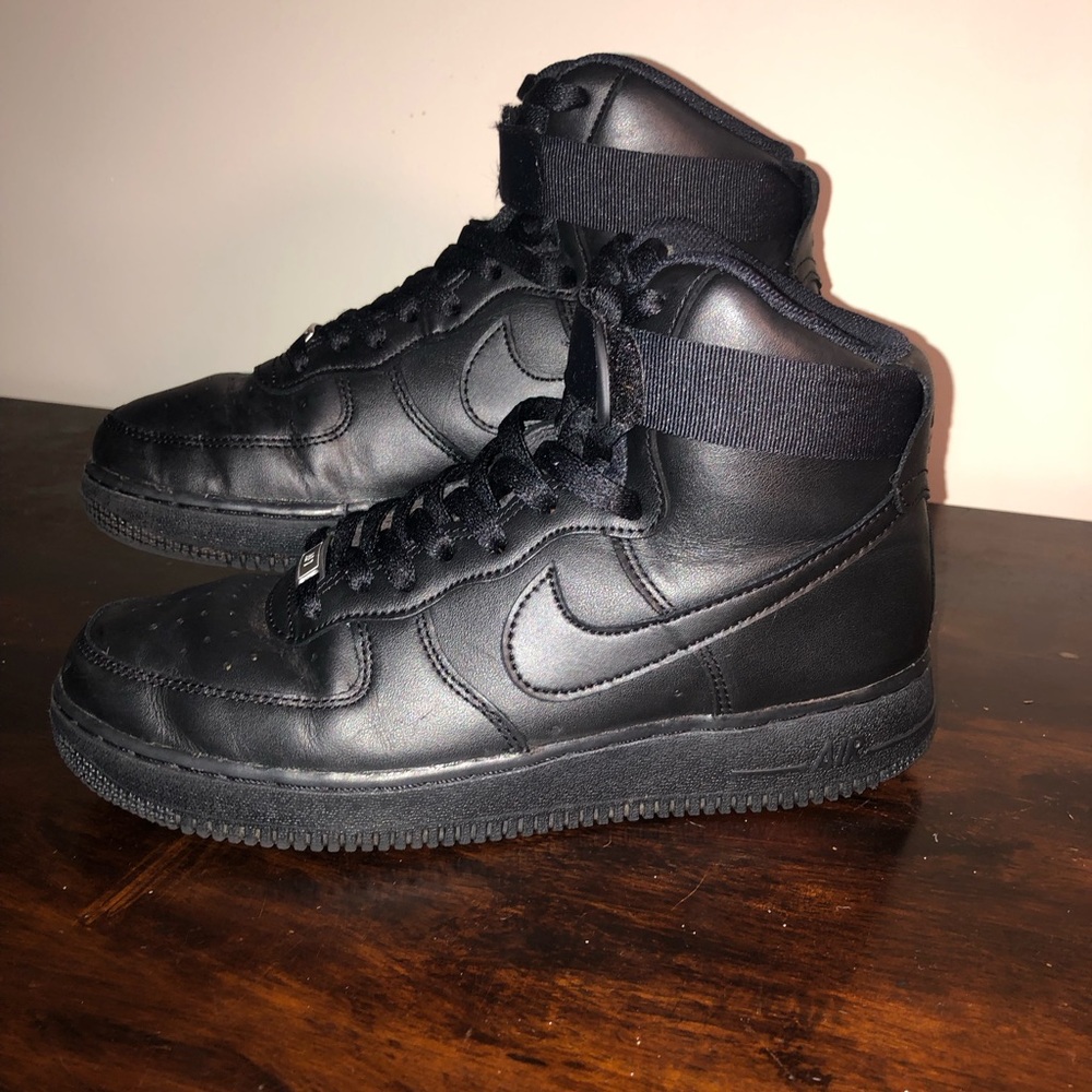 All black Nike Air Force 1’s high top basketball shoes